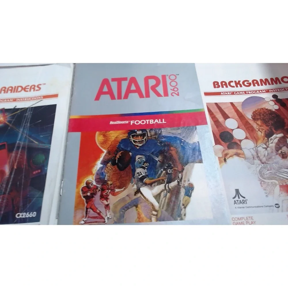 Lot of 7 Atari 2600 Games with Manuals Star Raiders Pac-Man Yars Revenge NTSC